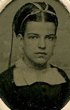 BEAUTIFUL BROWN EYED WOMAN WITH HAIR NET, RIBBON. TINTYPE, PERIOD PAPER MAT.