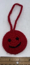 Novelty Yarn Crochet Smiley Face Red Christmas Tree Ornament 6” Long 2.75” Round