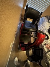 Pride 4-Wheeled Red Electric Mobility Scooter with Swivel Seat  Storage