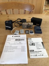 Canon IXUS 960 IS Titanium Digital Camera working, case, charger, SD, batteries