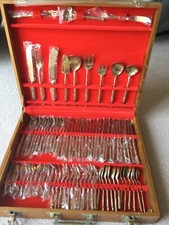 Bronze Dinner Service. 12 persons place setting. 144 pieces in wooden box. NEW