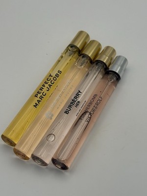 Bundle of 4 travel size perfume sprays Authentic Items Exactly As Pictured.