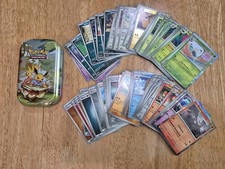 Pokemon misc card bundle 75 cards with collectible mini tin