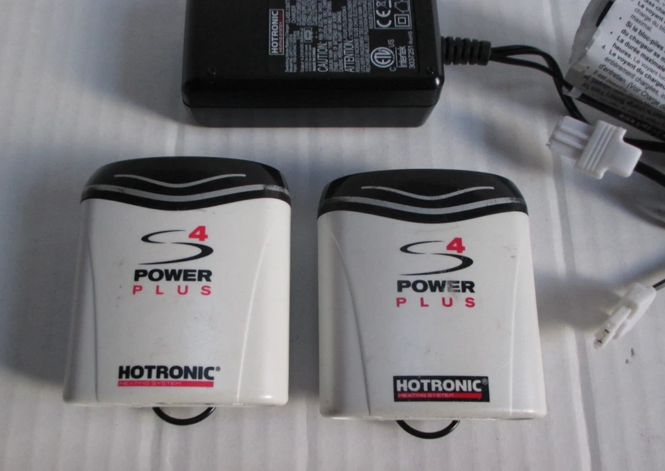 Par de paquetes de baterías y clips para calentador de pies Hotronic S4 Power Plus y cargador Foto 2 de 4