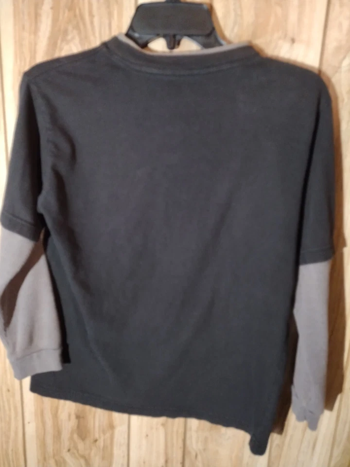 Camisa de manga larga New Balance para niños 10-12 Foto 2 de 4