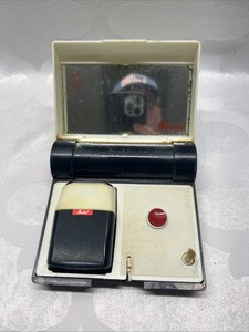 VINTAGE NORELCO RAZOR WITH BRUSH IN A TRAVELING CASE