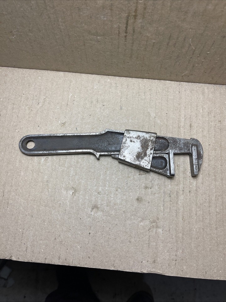 A beautifully odd wedge-lock quick-adjust wrench — the kind of mechanical ingenuity you don't see anymore, and it still works.