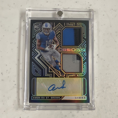 Panini Obsidian 2021 Amon-Ra St. Brown NO. RJI-ASB Rookie Jersey Auto Patch /25