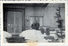 WW2 Photo of 2 Soldiers Standing in Snow at Building Entrance