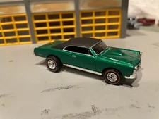 1/64H.W. 67 PONTIAC GTO "MOTOR CITY CLASSIC"  CANDY GREEN-BLACK TOP/REDLINE RR