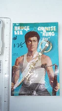 RARE - 1970s Bruce Lee Keychain, golden Semi-Halberd - SEALED