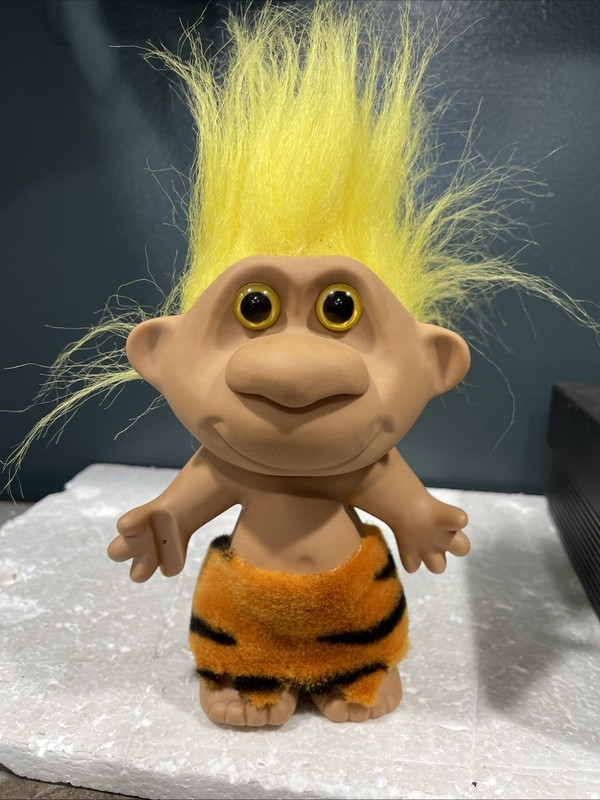 Vintage Dam Troll doll featuring bright neon yellow hair
