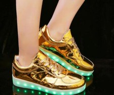 gold flashing trainers