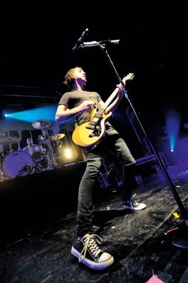 Alexander Gaskarth of pop punk group All Time Low performing live - Old Photo