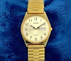 Vintage Pulsar by Seiko V533-8A70 Gold Tone Day-Date Dial Men's Watch 34mm