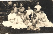 An Old Photograph of Women Young and Old Sitting Together Vintage Postcard