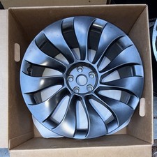 21-inch matte black "Uberturbine" wheel designed for a 2020-2024 Tesla Model Y