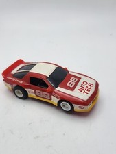 AURORA AFX TOMY 80s Chevy Camaro 88 Auto Tech HO Slot Car Red White Yellow Runs
