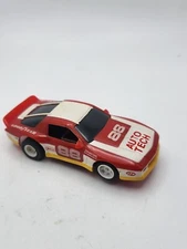 AURORA AFX TOMY 80s Chevy Camaro #88 Auto Tech HO Slot Car Red White Yellow Runs