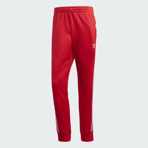red adidas cuffed track pants