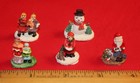 Christmas Village Lot of 10 Figures - 12 People, Santa, Tree, Dog & Snowman — photo 2