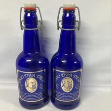 Lot Of 2 Vtg CZ Cap Wire Bail Stopper Cobalt Blue Glass Bottle 9.5” Doo Daa Dew