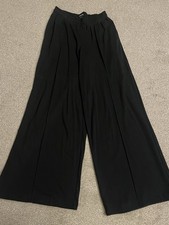 women’s black wide leg joggers comfortable fit material is flared like 