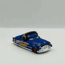 Disney Pixar Cars - PIT CREW FABULOUS HUDSON HORNET WITH HEADSET - 1:55 Diecast