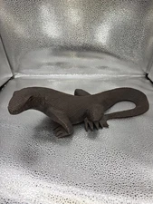 Hand-carved wooden lizard sculpture of a Komodo dragon