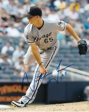 NATE JONES   CHICAGO WHITE SOX   ACTION SIGNED 8x10
