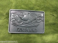  D171. 1987 GUNS  AMMO BELT  BUCKLE
