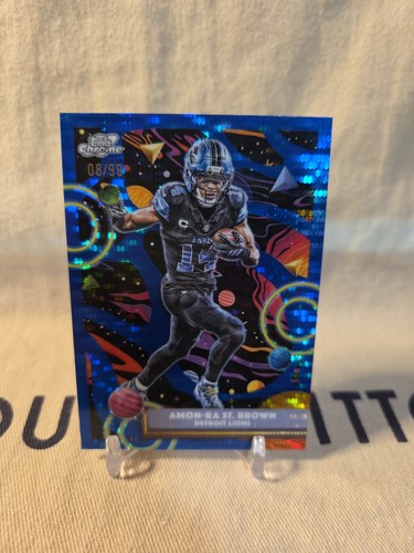 Topps Cosmic Chrome 2025 Amon-Ra St. Brown Blue Moon Refractor /99 Detroit Lions