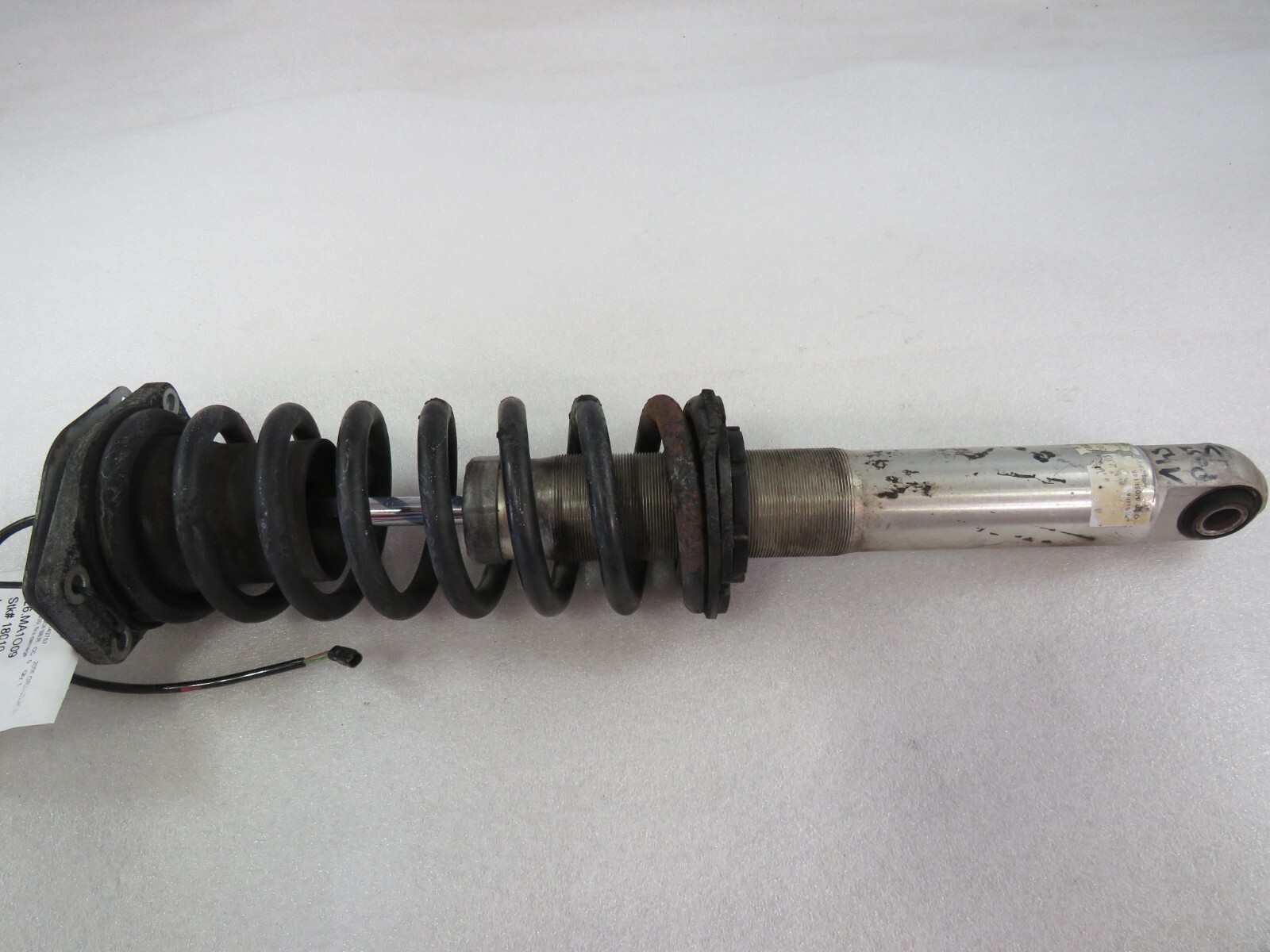 Maserati Granturismo, Rear Shock Absorber, Fire Dmg, Used, P/N 230030