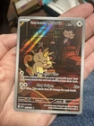Team Rocket's Meowth 203/182 Sv10: Destined Rivals Holo
