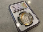 1887 Morgan $1 NGC MS 62 Reversed Crescent Toned Bullion Plus Eye Candy Series 1