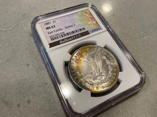 1887 Morgan $1 NGC MS 62 Reversed Crescent Toned Bullion Plus Eye Candy Series 1