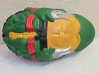 Green 1991 Mirage Studios TMNT Football Raphael with yellow belly, black mask, and red-black arm straps.