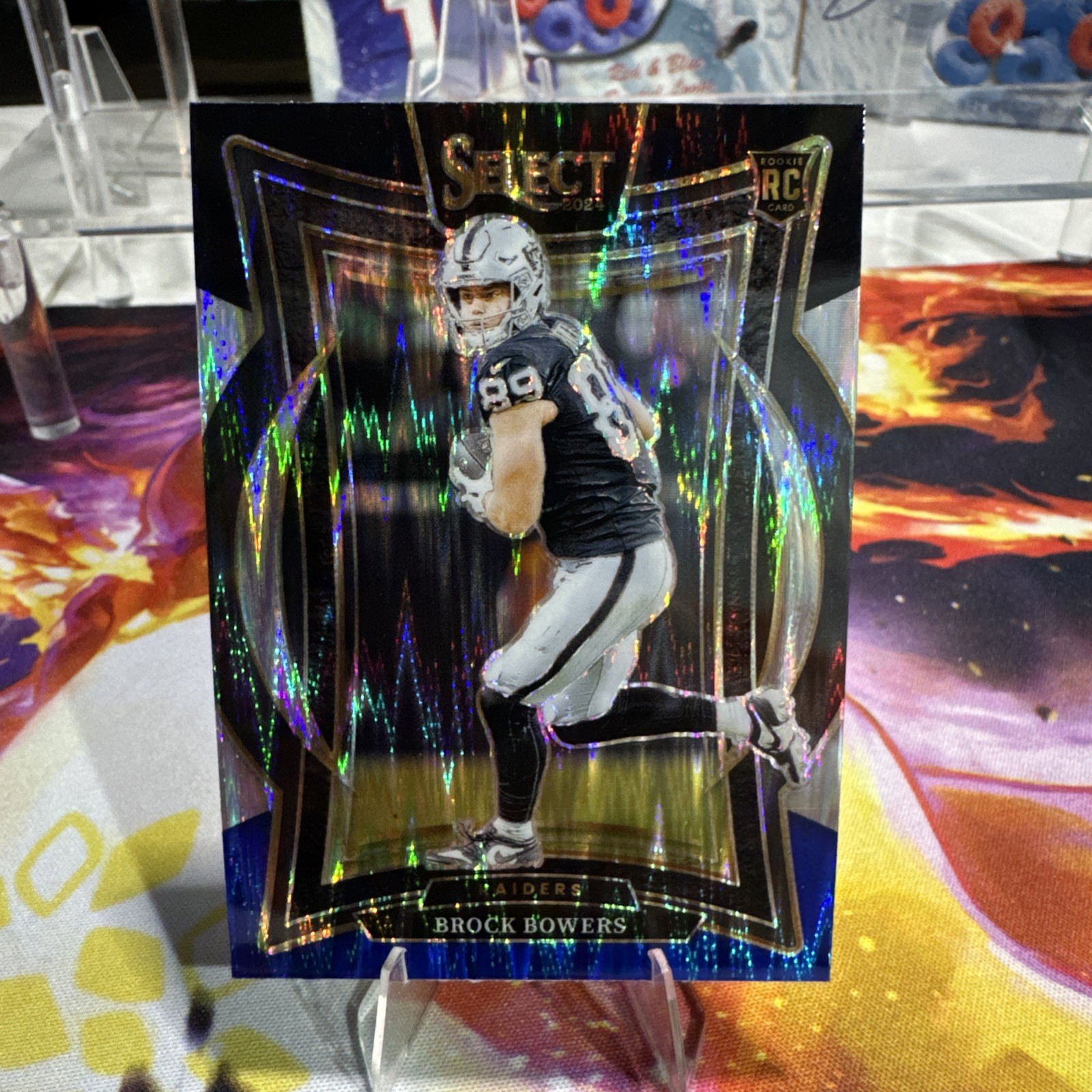 2024 Panini Select - Concourse Brock Bowers #31 Black & Blue Shock Prizm (RC)