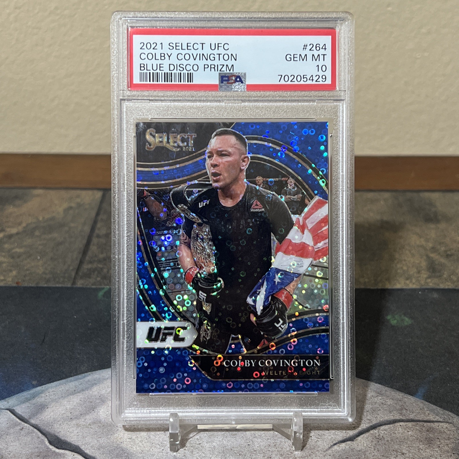 2021 Panini Select UFC #264 Colby Covington Blue Disco Prizms #/99
