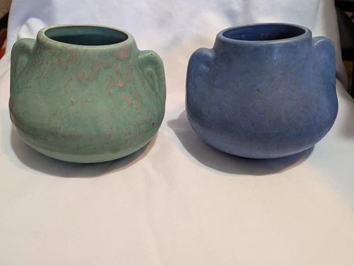 Pair of brush McCoy ear handle ceramic pottery vases - 1 blue, 1 green, read