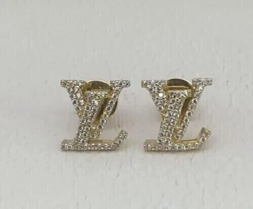 Pendiente cruzado de moissanita de corte redondo de 1,50 quilates enchapado en oro amarillo de 14 k Foto 2 de 4