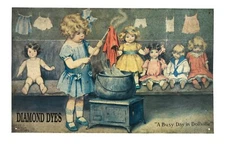Metal Tin Sign A Busy Day in Dollville Bessie P Gutmann Balliol Co Diamond Dyes