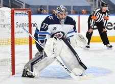 connor hellebuyck Winnipeg Jets 8x10 unsigned photo