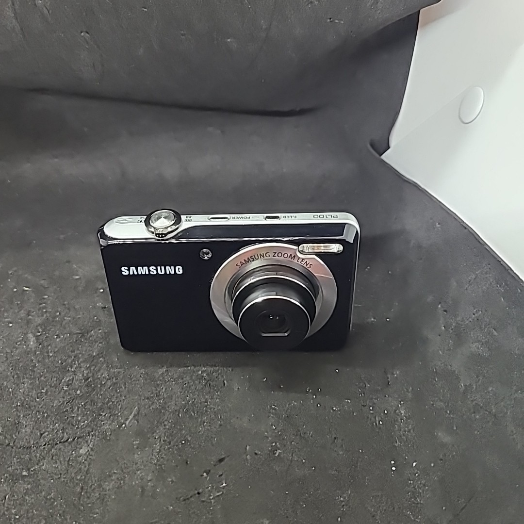 Samsung PL100 12.2MP Compact Digital Camera With Selfie Front
