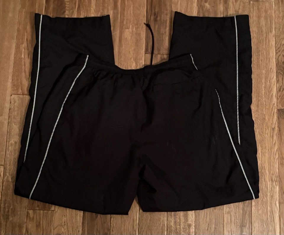 Pantalones de chándal vintage Nike One Line para hombre talla grande negros con línea blanca Foto 3 de 3