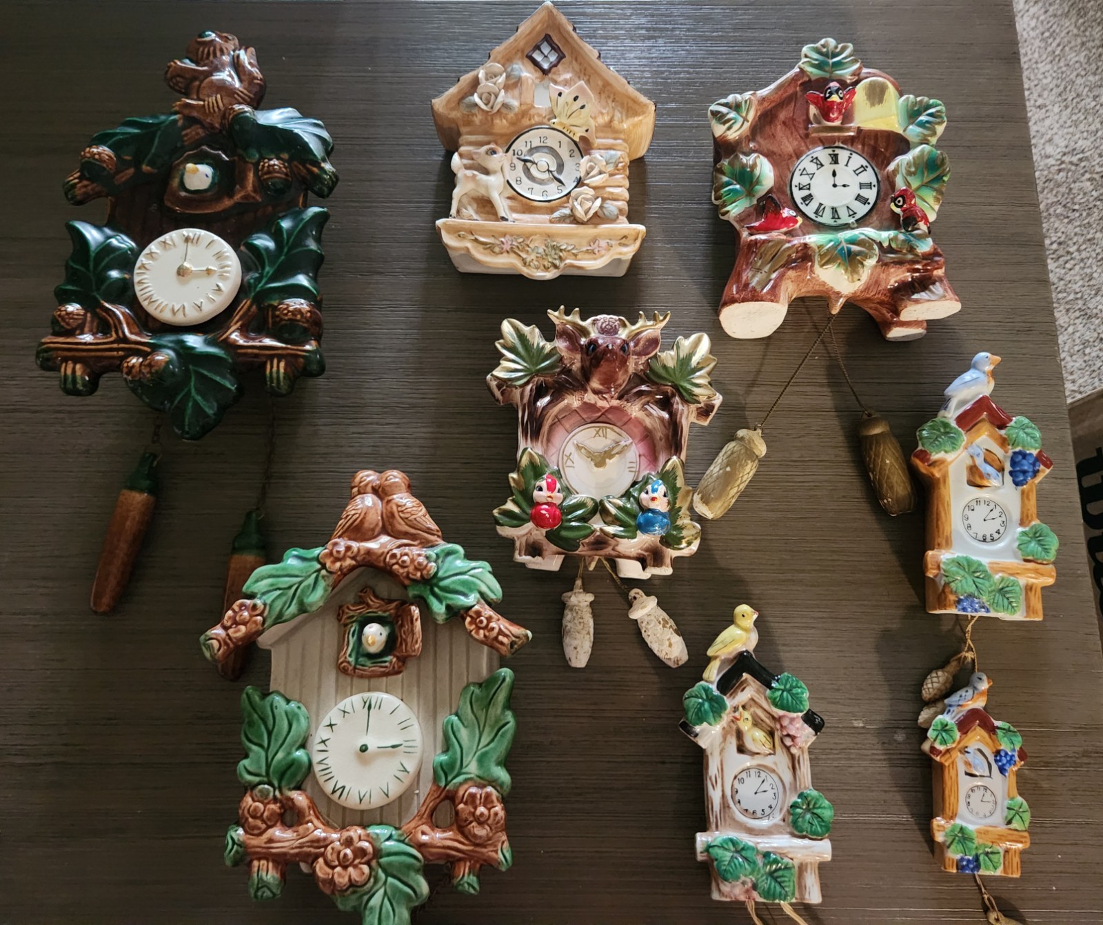 VINTAGE WALL POCKET CLOCKS. LOT OF 8