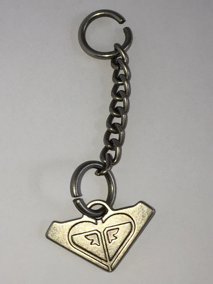 ROXY LOGO Metal CARTERA ENCANTO Mochila PLATA Vintage Coleccionable CADENA Llavero Foto 2 de 4