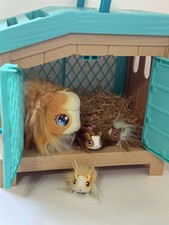 Little Live Pets Mama Guinea Pig with Hutch and 3 Surprise Babies - 26410