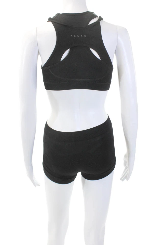 Conjunto de mini pantalones cortos deportivos sin mangas cruzadas con cremallera texturizada Falke para mujer talla negra Foto 3 de 4