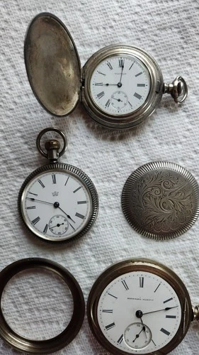 3 for 1 price- pocket watches by Waltham, Elgin and Waterbury. 2 with coin cases
